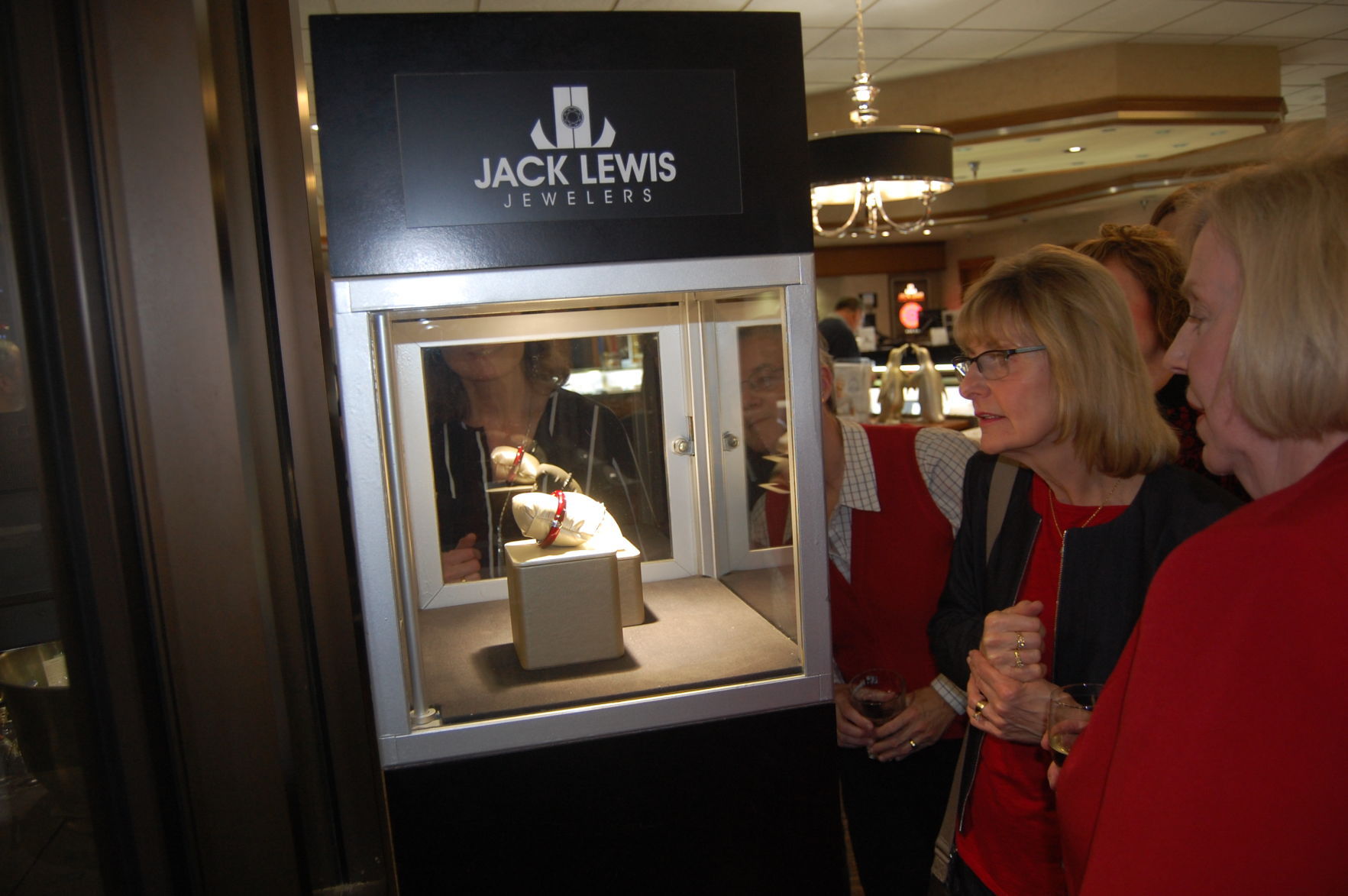 Kathy Bohn and Karen Hanson check out the new bracelets